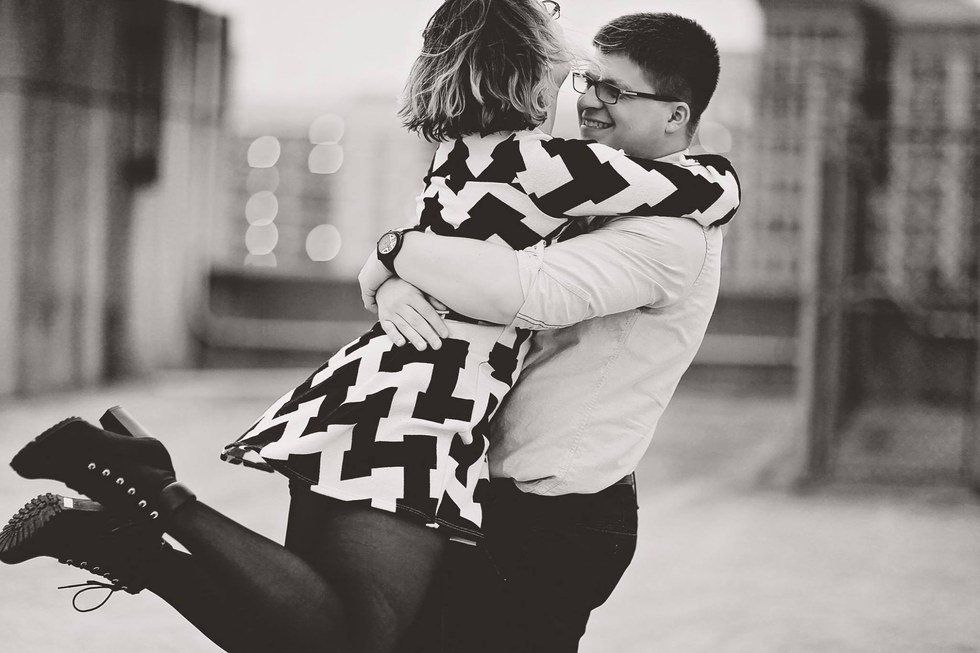 A man and woman hugging