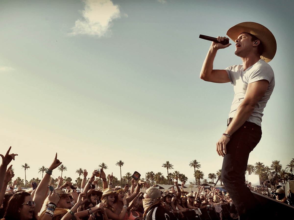 20 Country Songs To Make Summer Last Through Football Season