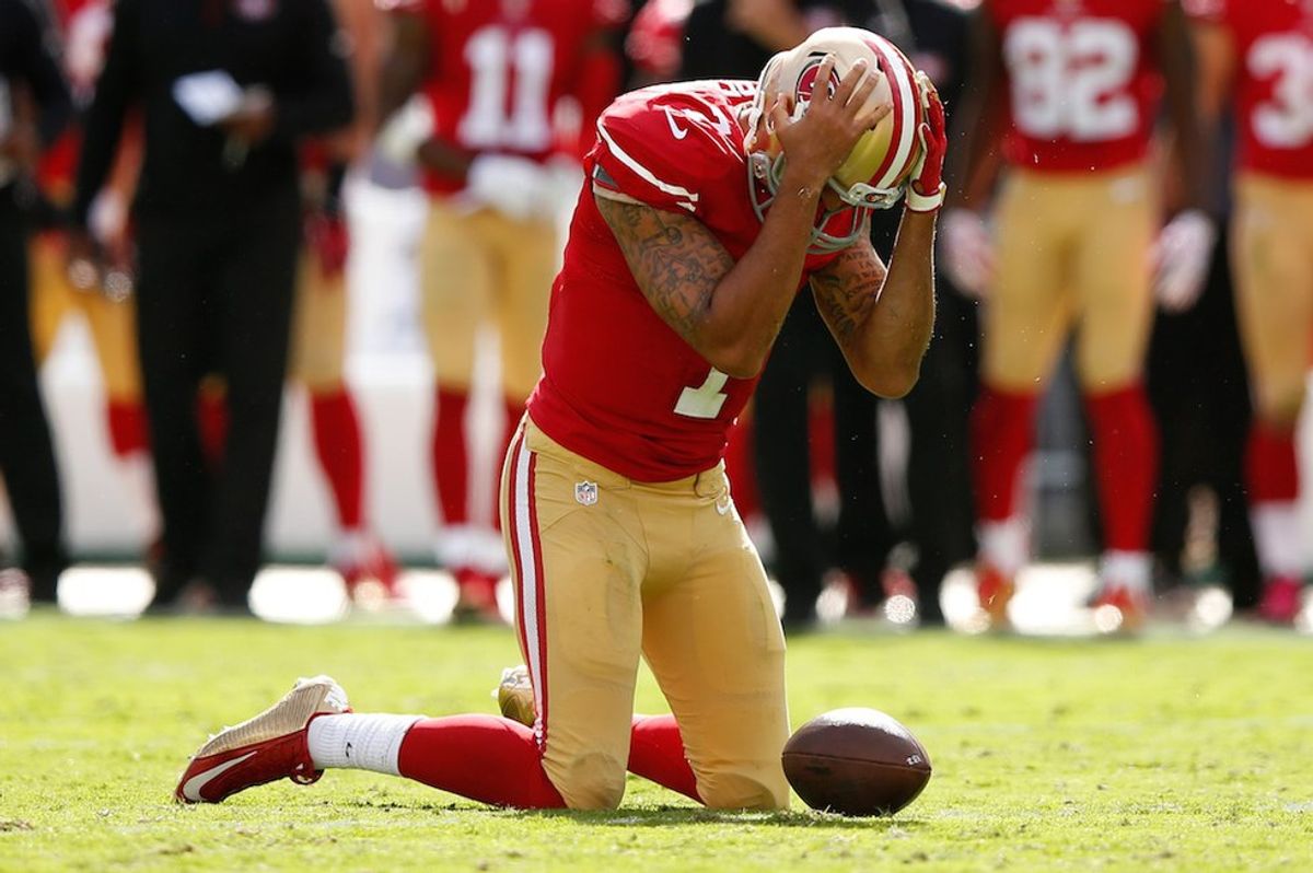 Football Player Stays Seated, Literally Nothing Changes