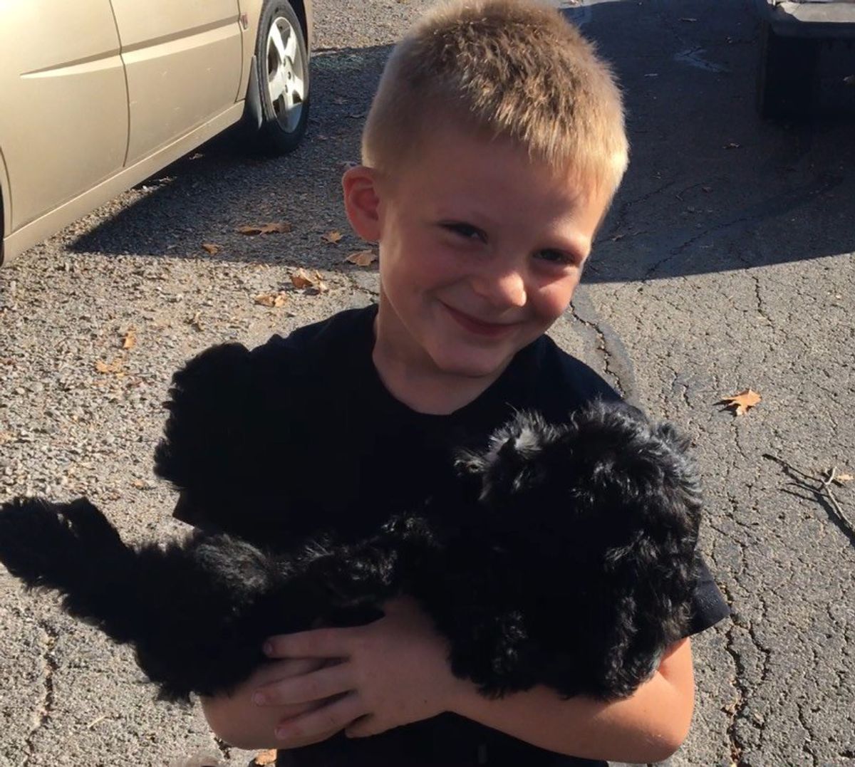 Behind-The-Scenes Footage Of A Boy And His New Puppy