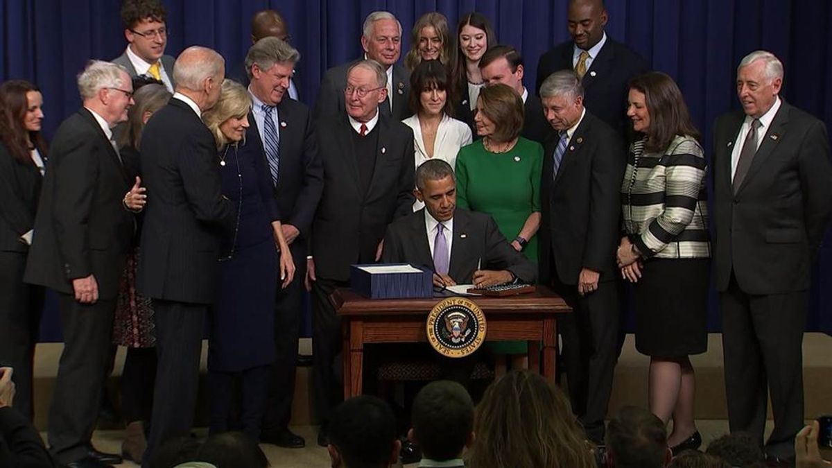 Obama Signs Cures Act To Invest In Medical Research And Technology