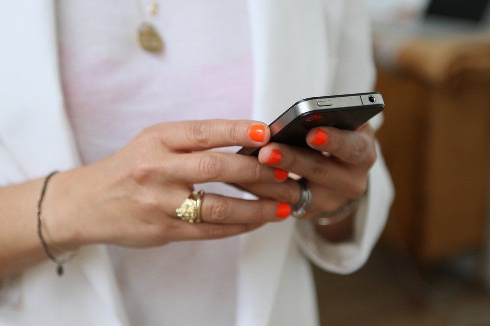 girl holding phone