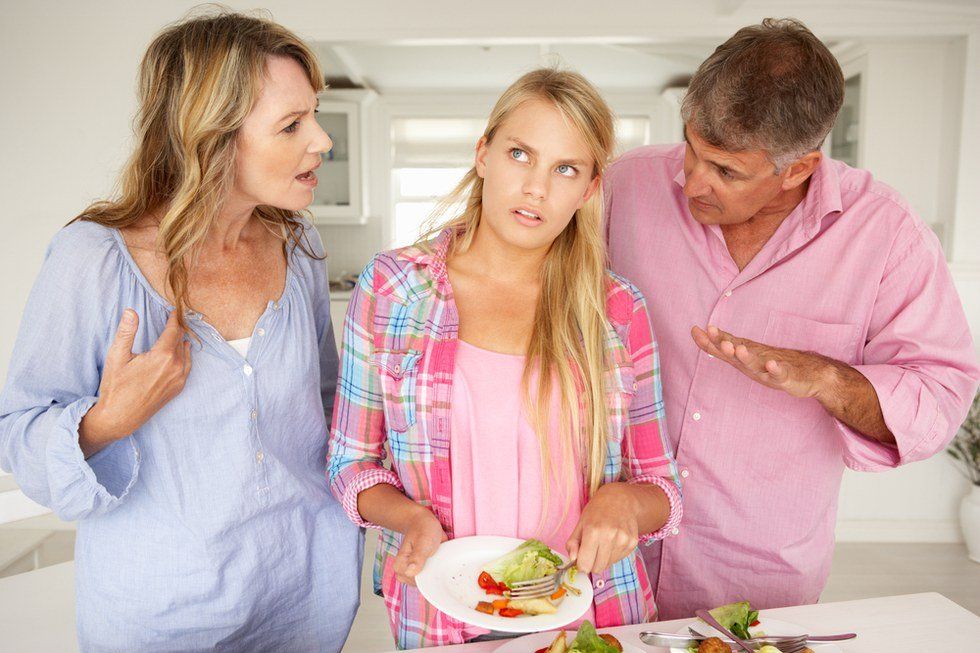 girl with parents