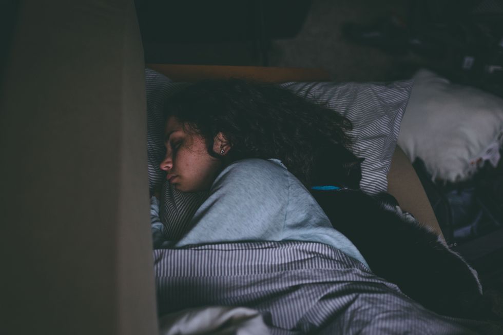 https://www.pexels.com/photo/woman-sleeping-1497855/