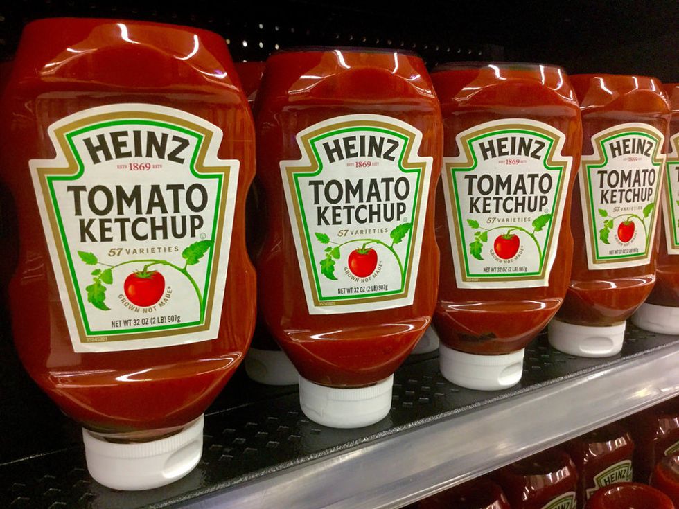 Ketchup Bottle With Layer Of Crust Around Cap Replaced With New Bottle