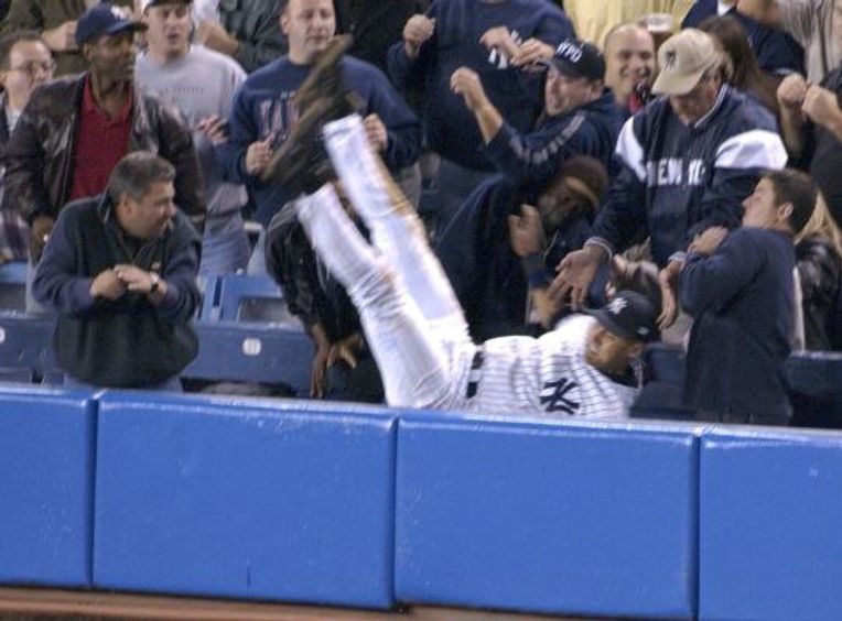 Derek Jeter foul ball pocketed by ball boy during final Yankee Stadium game  (GIF) 