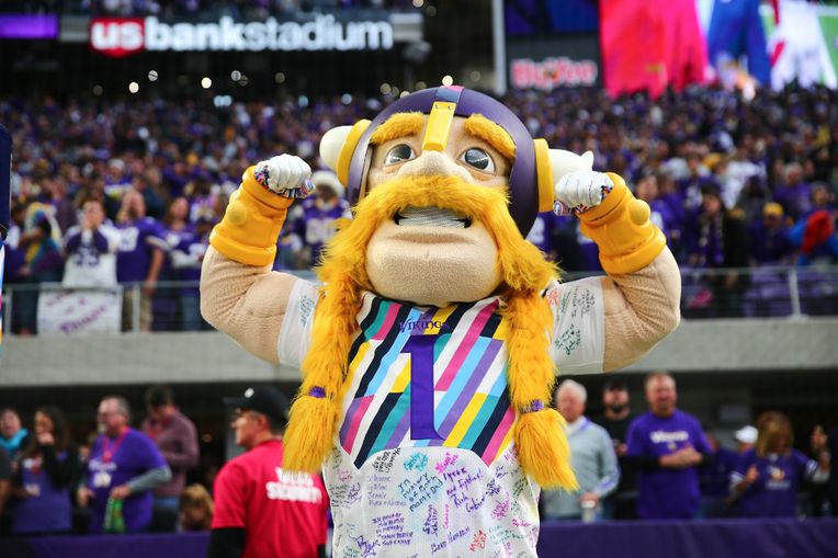 Minnesota Vikings mascot Viktor the Vikings displays his gloves