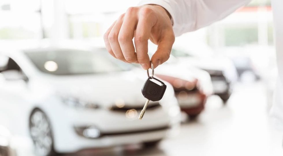 What are the core characteristics of the used car dealer today?