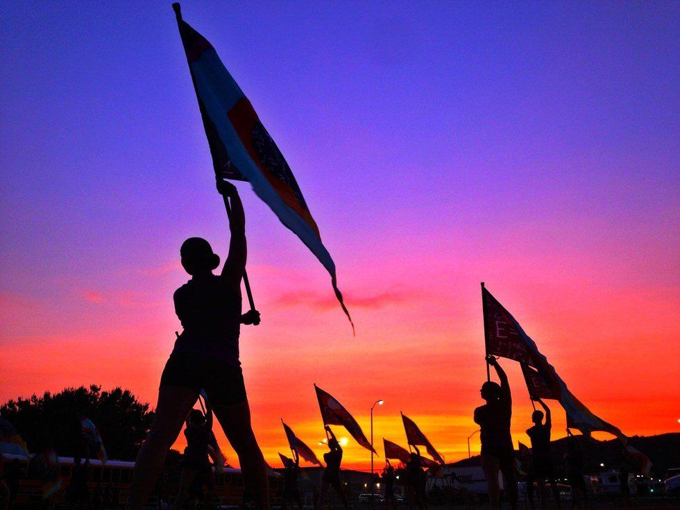 Why Color Guards Are So Important To Marching Bands