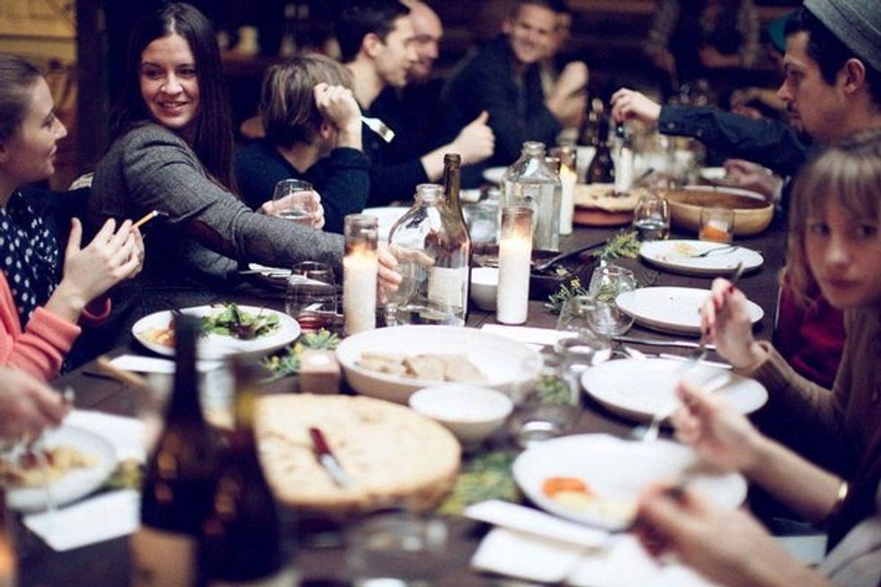 Six Family Members At Everyone's Dinner Table