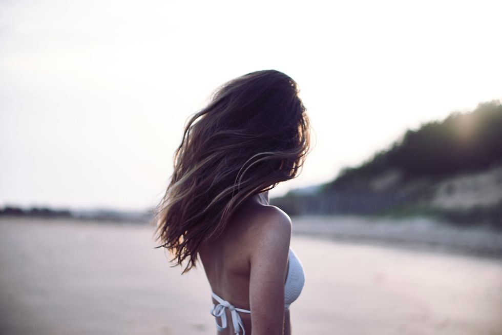 woman on beach in bikini